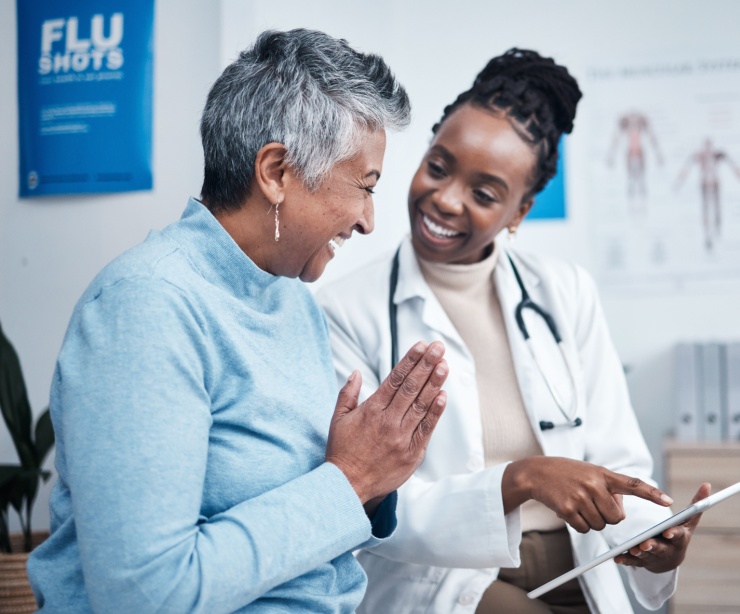 A doctor talking to a female patient.
