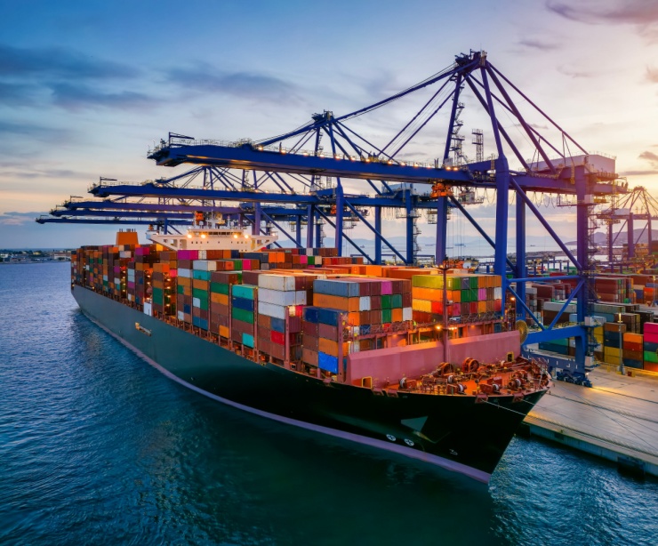 A container cargo ship at a commercial dock.