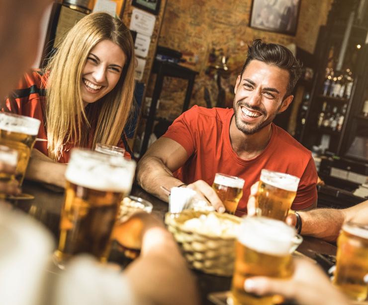 Friends having a drink in the pub.