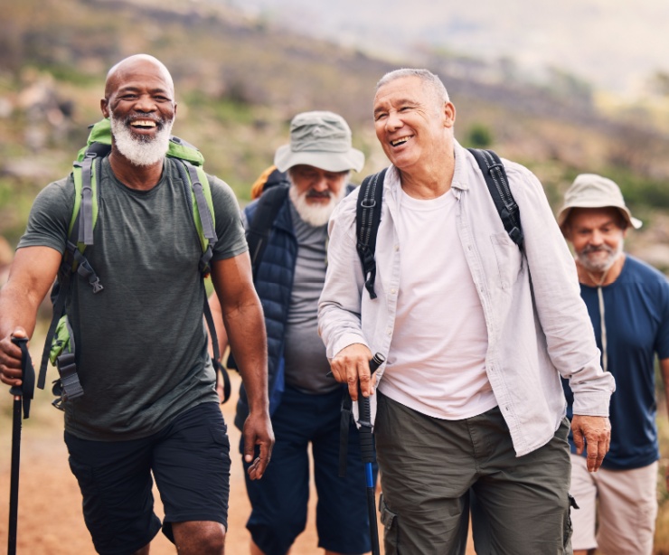 A group of men hiking together.