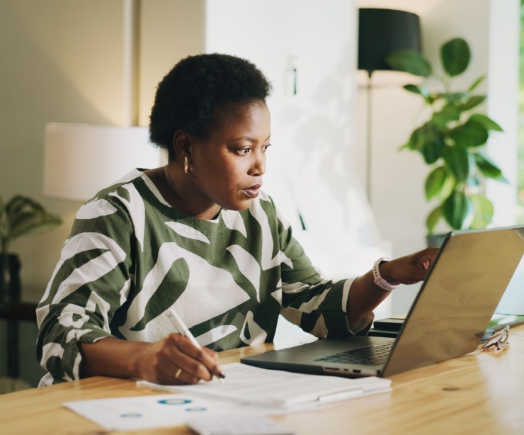 A woman on her computer.