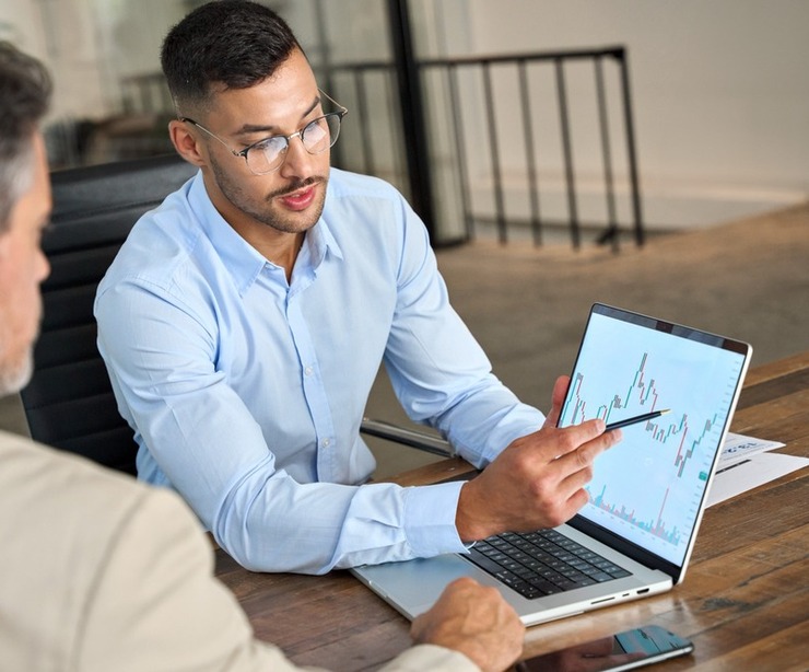 A financial adviser using a graph to explain investment performance.